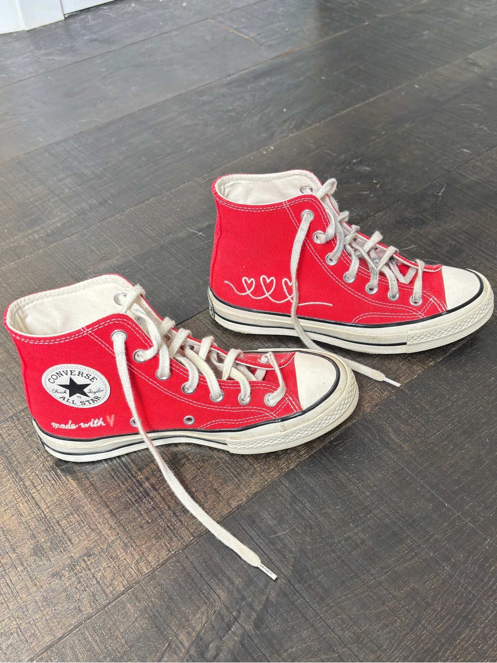Red converse with heart details